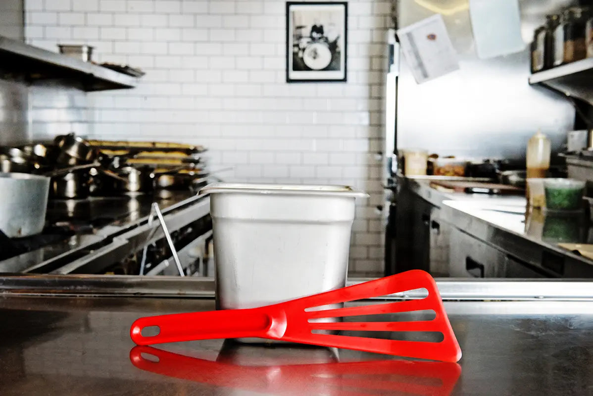 Exoglass® 12" Slotted Pelton Spatula, Red